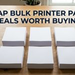 Stacks of white printer paper on a desk with the title Cheap Bulk Printer Paper Deals Worth Buying.
