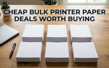 Stacks of white printer paper on a desk with the title Cheap Bulk Printer Paper Deals Worth Buying.